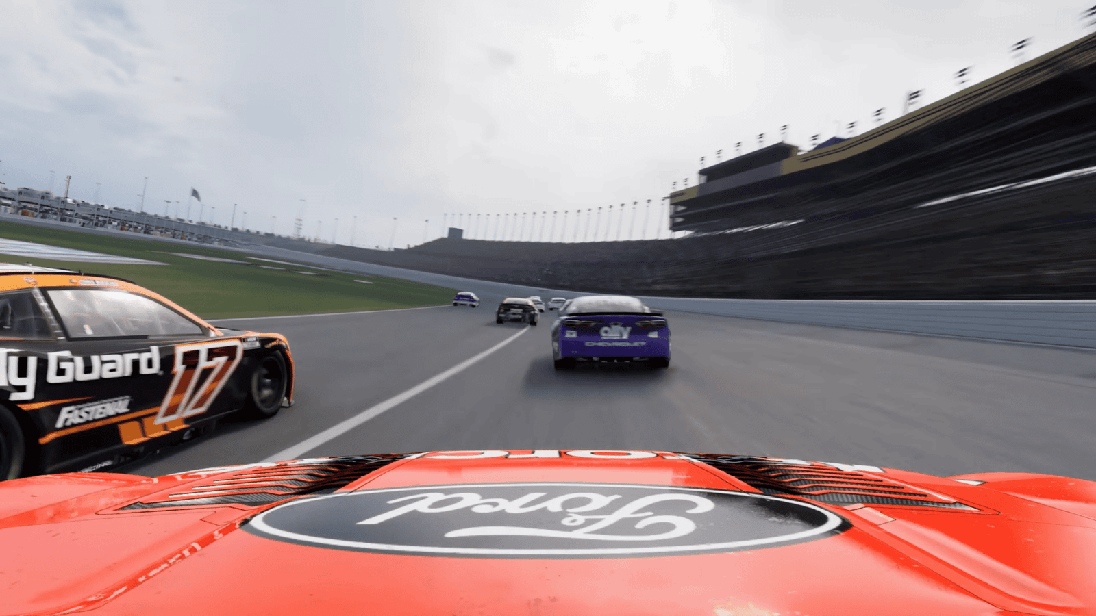 NASCAR 26 gameplay showing Cup Series cars drafting on a large superspeedway from a chase camera behind a red Ford, with the black and orange number 17 Body Guard Ford running alongside