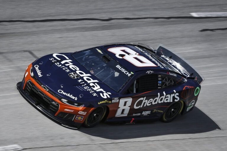 Kyle Busch in his No. 8 Cheddars car at Talladega Superspeedway, one of the real-world rides featured in NASCAR 26