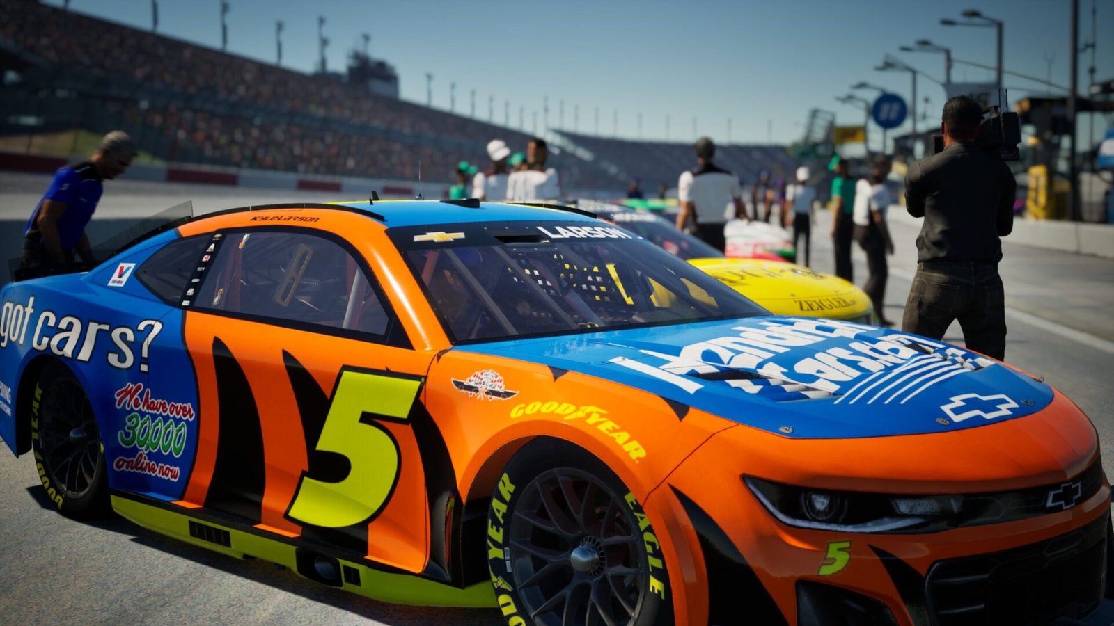 NASCAR 25 garage settings screen showing all adjustment sliders for springs, shocks, tire pressure, and camber