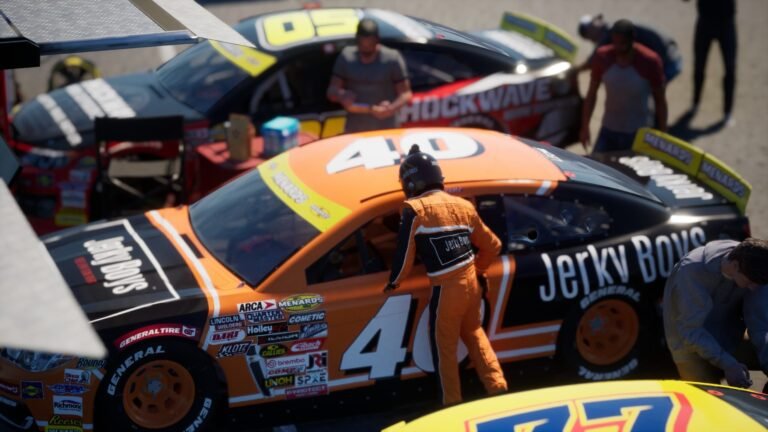 NASCAR 26 garage scene with the #40 Jerky Boys ARCA Chevrolet SS and crew in Career Mode